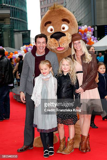 Gedeon Burkhard, Anika Bormann, daughter Gioia with her girlfriend Charlotte attend the 'Keinohrhase und Zweiohrkueken' Premiere at CineStar on...