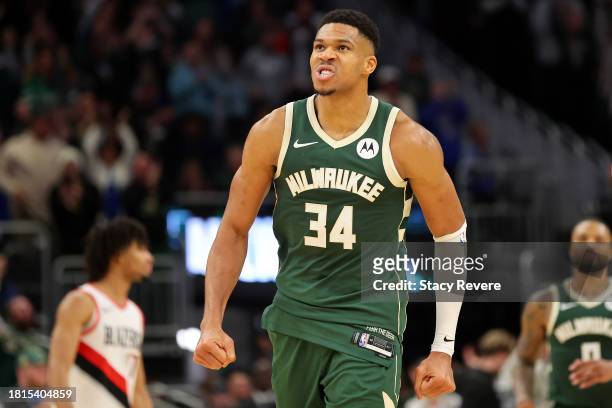Giannis Antetokounmpo of the Milwaukee Bucks reacts to a score during the second half of a game against the Portland Trail Blazers at Fiserv Forum on...
