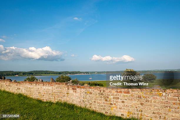 old wall surrounding "kalo slots" ruin - kattegat stock pictures, royalty-free photos & images