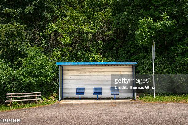 bus stop in the country side - bus stop stock pictures, royalty-free photos & images