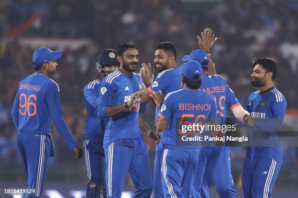 Axar Patel of India celebrates the wicket of Travis Head of Australia during game four of the T20 International series between India and Australia at...