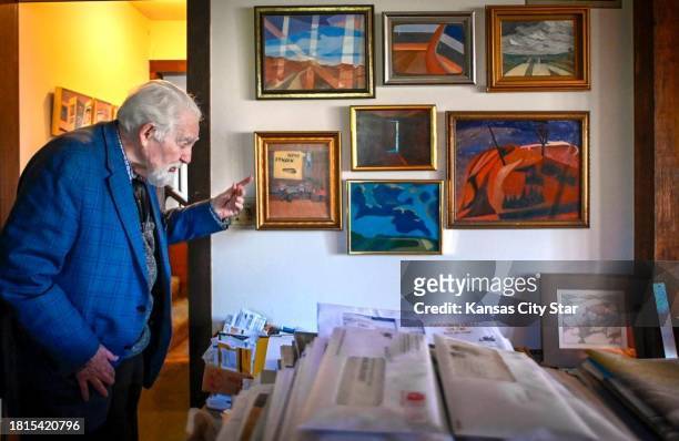 Fred McCraw, a friend of the late artist Thomas Hart Benton, discusses some of his own paintings in his home in Merriam.