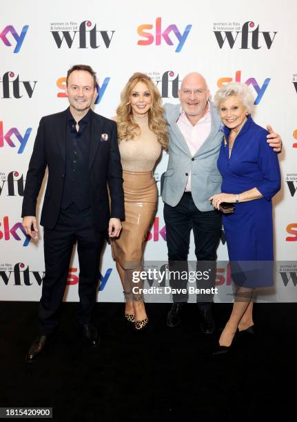 Peter Widmann, Carol Vorderman, Richard Fish and Angela Rippon attend the Women in Film & Television Awards 2023 at London Hilton Park Lane on...