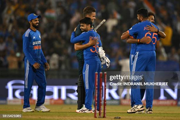 India's Rinku Singh is greeted by Australia's Chris Green at the end of the fourth Twenty20 international cricket match between India and Australia...