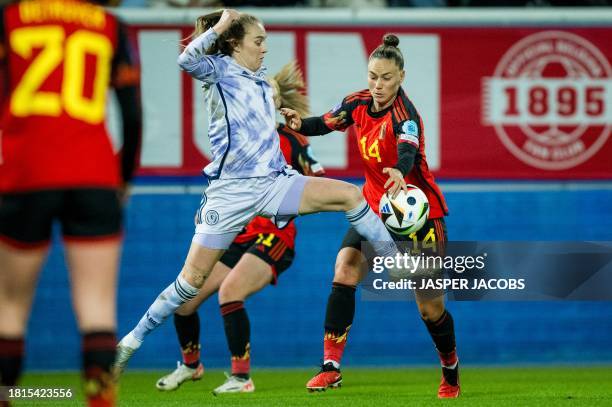 Scotland's Fiona Brown and Belgium's Davinia Vanmechelen fight for the ball during a soccer match between Belgium's national women's team the Red...