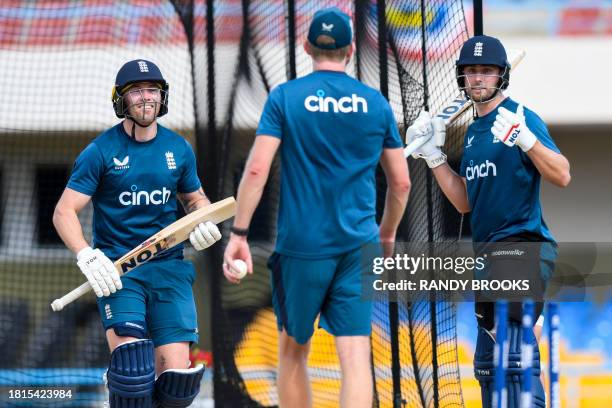 Phil Salt and Gus Atkinson of England take part in a training session two days ahead of the 1st ODI between West Indies and England at Vivian...