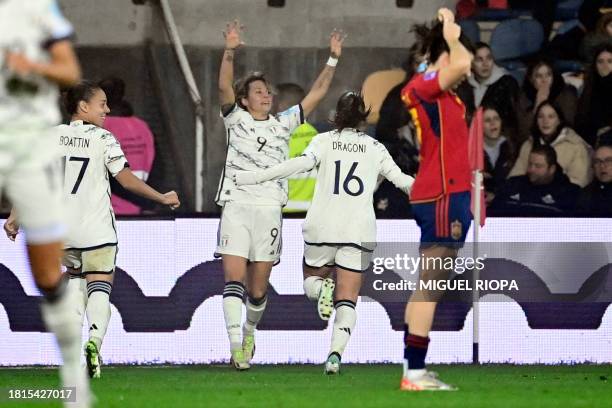 Italy's forward Valentina Giacinti celebrates scoring an equalizing goal during the UEFA Women's Nations League group A4 football match between Spain...