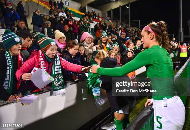 Dublin , Ireland - 1 December 2023; Caitlin Hayes of Republic of Ireland gives her jersey to a supporter after their side's victory in the UEFA...