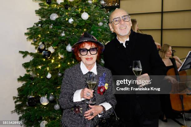 Burglind-Christin Schulze-Herrmann and Manfred Herrmann during the IWC Christmas Cocktail at IWC Schaffhausen Boutique on December 1, 2023 in Berlin,...