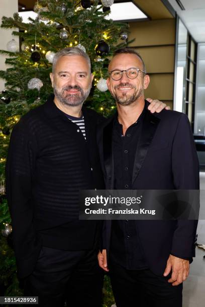 Adrian Runhof and Eric Erhardt during the IWC Christmas Cocktail at IWC Schaffhausen Boutique on December 1, 2023 in Berlin, Germany.