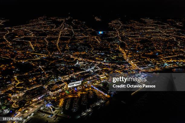 General view of the center city of Funchal with the Christmas city lights on December 1, 2023 in Funchal, Madeira, Portugal. Portugal's Madeira is an...