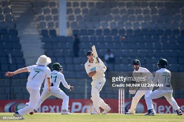 New Zealand's Tim Southee plays a shot during the fifth day of the first Test cricket match between Bangladesh and New Zealand at the Sylhet...