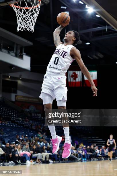 Ronald Holland II of the G League Ignite dunks the ball during the game against the Stockton Kings on December 1, 2023 at Stockton Arena in Stockton,...