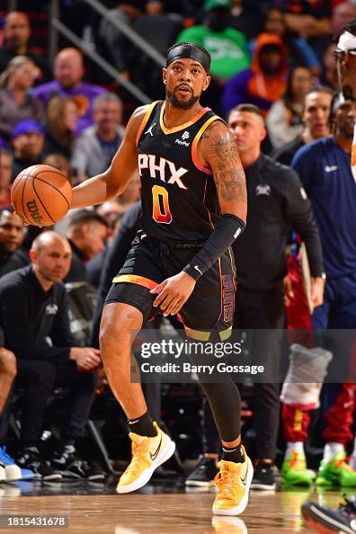 Jordan Goodwin of the Phoenix Suns dribbles the ball during the game ...