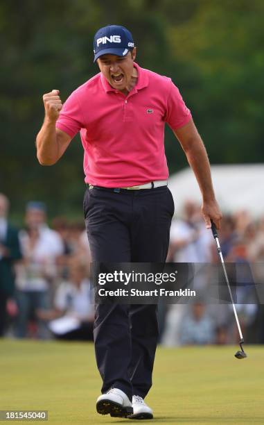 Julien Quesne of France celebrates winning on the 18th hole during the final round of the Italian Open golf at Circolo Golf Torino on September 22,...