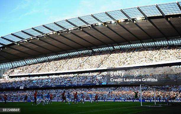 Joe Hart of Manchester City fails to stop Wayne Rooney of Manchester United scoring from a free kick for their first goal during the Barclays Premier...