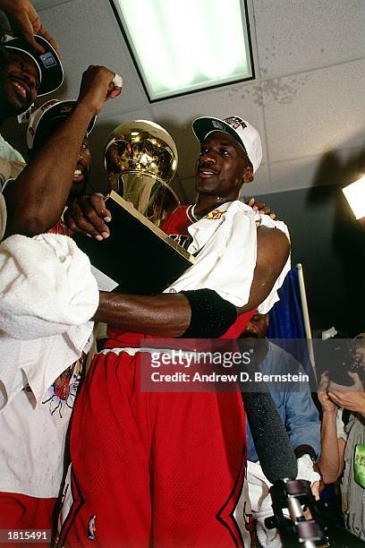 Michael Jordan of the Chicago Bulls celebrates winning the 1993 NBA Championship Finals, after winning Game Six against the Phoenix Suns at America...