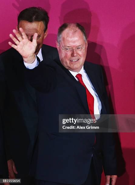 Peer Steinbrueck, chancellor candidate of the German Social Democrats , waves as he leaves the stage at SPD party headquarters Willy-Brand-Haus on...