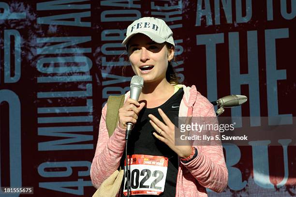 Lauren Bush speaks onstage during the Women's Health Magazine RUN10 FEED10 NYC 10K Race Event at Pier 84 on September 22, 2013 in New York City.