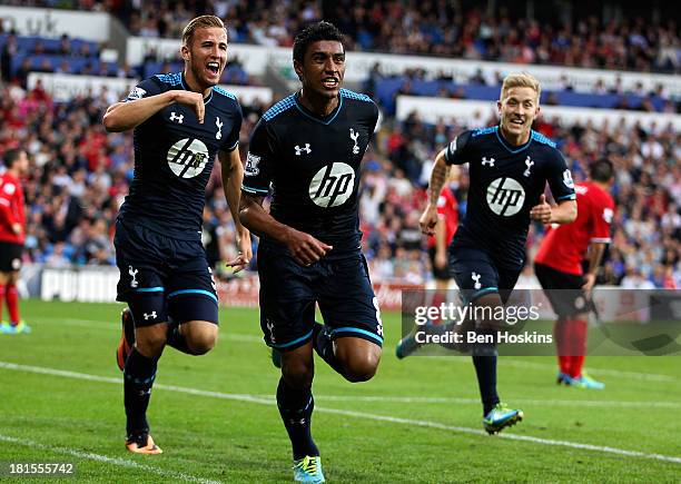 Paulinho of Tottenham celebrates after scoring the winning goal during the Barclays Premier League match between Cardiff City and Tottenham Hotspur...