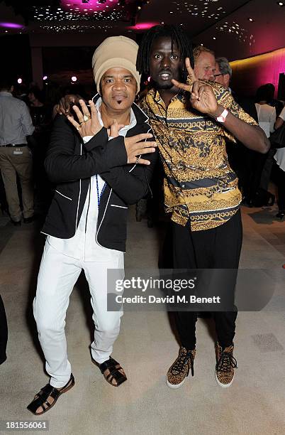 Carlinhos Brown and Emmanuel Jal celebrate 'Peace One Day' at the Peace One Day concert after party held at the Hilton on September 21, 2013 in The...