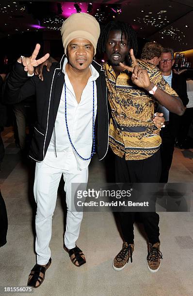 Carlinhos Brown and Emmanuel Jal celebrate 'Peace One Day' at the Peace One Day concert after party held at the Hilton on September 21, 2013 in The...