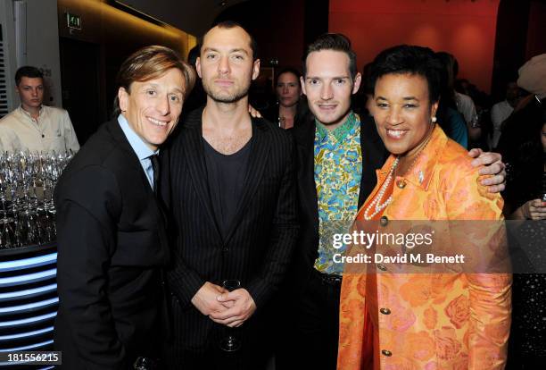 Peace One Day founder Jeremy Gilley, Jude Law, Dan Gillespie Sells and Baroness Patricia Scotland celebrate 'Peace One Day' at the Peace One Day...