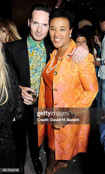 Dan Gillespie Sells and Baroness Patricia Scotland celebrate 'Peace One Day' at the Peace One Day concert after party held at the Hilton on September...