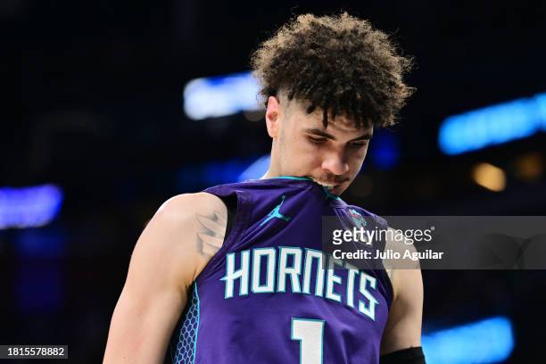 LaMelo Ball of the Charlotte Hornets walks off the court in the first half of a game against the Orlando Magic at Amway Center on November 26, 2023...