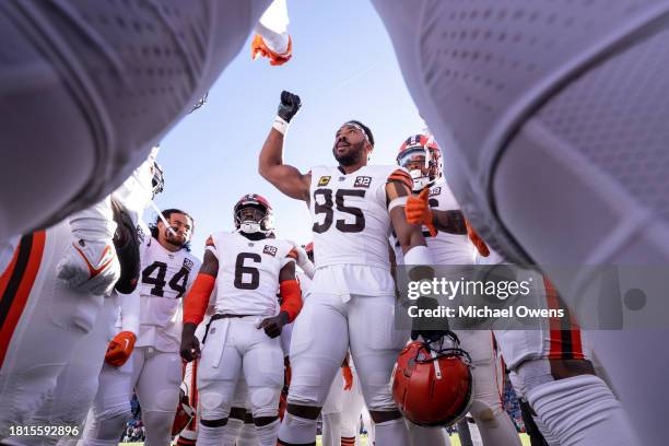 Myles Garrett of the Cleveland Browns reacts as he leads a huddle prior to an NFL football game between the Denver Broncos and the Cleveland Browns...