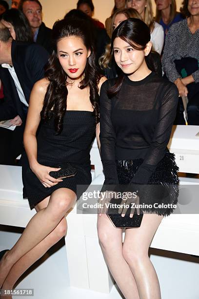 Janie Tienphosuwan and Michelle Chen attends the Salvatore Ferragamo show as part of Milan Fashion Week Womenswear Spring/Summer 2014 at on September...