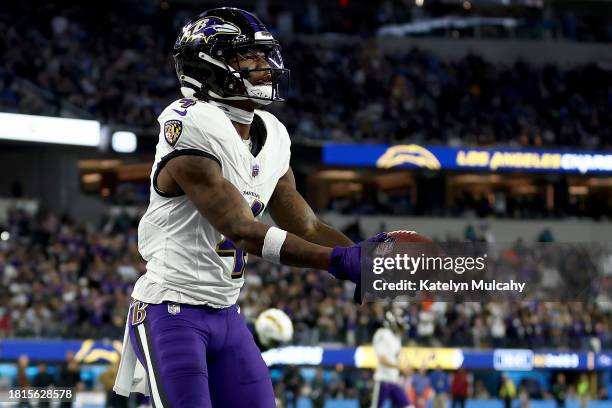 Zay Flowers of the Baltimore Ravens celebrates after scoring a touchdown against the Los Angeles Chargers during the second quarter in the game at...