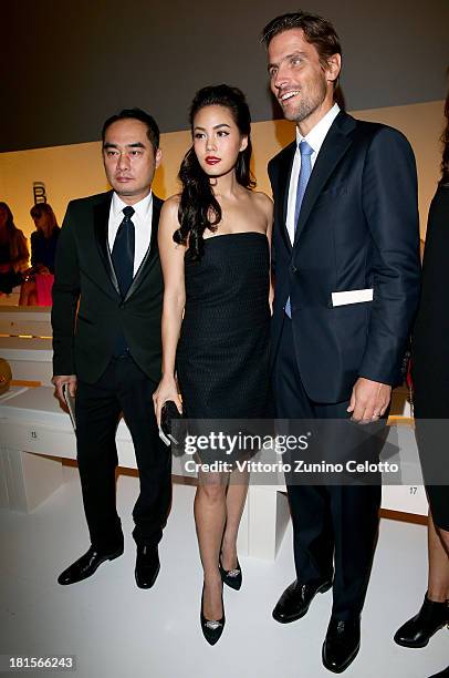 Janie Tienphosuwan and James Ferragamo attend the Salvatore Ferragamo show as part of Milan Fashion Week Womenswear Spring/Summer 2014 at on...