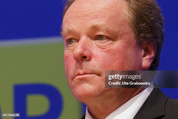 German Development Minister Dirk Niebel reacts to the announcement of the first projections for the parliamentary elections at Berlin Congress Center...