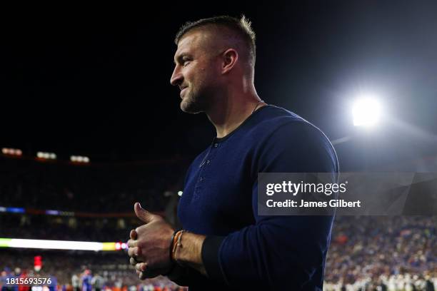 Former Florida Gators Quarterback and Heisman Trophy winner Tim Tebow looks on during the first half of a game between the Florida Gators and the...