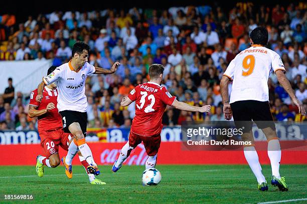 Jonas Goncalves of Valencia CF scores the opening goal during the La Liga match between Valencia CF and Sevilla FC at Estadio Mestalla on September...