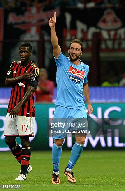 Gonzalo Higuain of SSC Napoli celebrates scoring their second goal during the Serie A match between AC Milan and SSC Napoli at San Siro Stadium on...