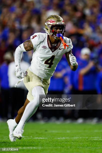 Keon Coleman of the Florida State Seminoles runs during the second half of a game against the Florida Gators at Ben Hill Griffin Stadium on November...