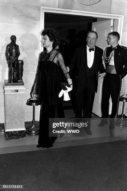 Mercia Tinker and Rex Harrison attend an event at the White House in Washington, D.C., on December 7, 1981.