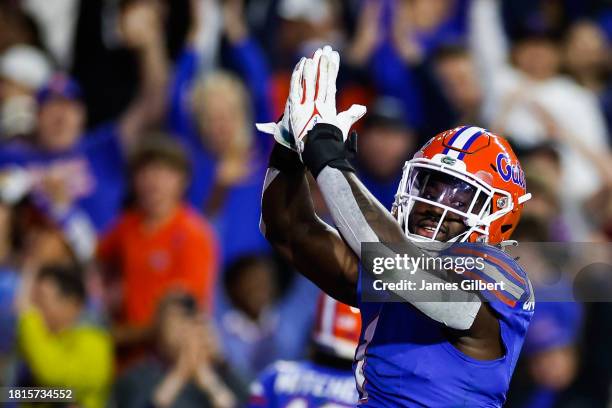 Princely Umanmielen of the Florida Gators celebrates a safety during the first half of a game against the Florida State Seminoles at Ben Hill Griffin...