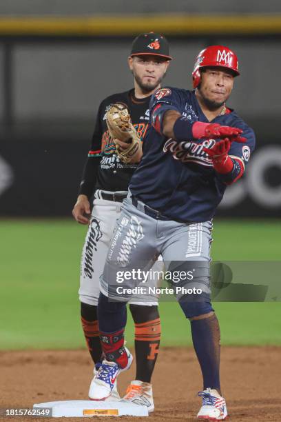 Yangervis Solarte of Aguilas de Mexicali celebrates a double off second base Jason Atondo of Naranjeros in the third inning, during a game between...