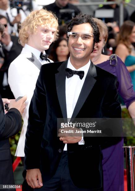 Actor Kunal Nayyar arrives wearing Google Glass at the 65th Annual Primetime Emmy Awards held at Nokia Theatre L.A. Live on September 22, 2013 in Los...