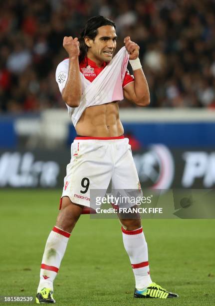 Monaco's Colombian forward Radamel Falcao celebrates after scoring his team's equaliser during the French L1 football match between Paris...