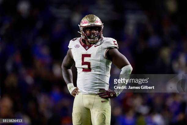 Jared Verse of the Florida State Seminoles looks on during the second half of a game against the Florida Gators at Ben Hill Griffin Stadium on...