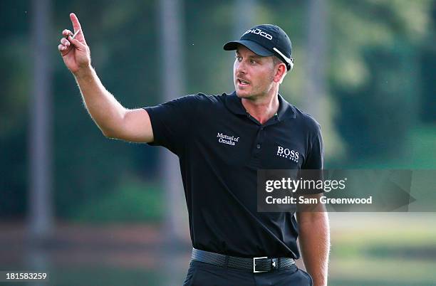 Henrik Stenson of Sweden walks across the 17th green during the final round of the TOUR Championship by Coca-Cola at East Lake Golf Club on September...