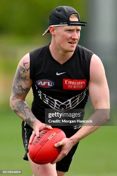 John Noble of the Magpies trains during a Collingwood Magpies AFL training session at Gosch's Paddock on November 27, 2023 in Melbourne, Australia.