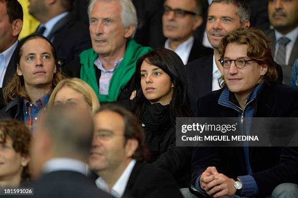 Pierre Sarkozy and Jean Sarkozy , sons of former French president Nicolas Sarkozy, and Jean Sarkozy's wife, Jessica Sebaoun-Darty, attend the French...