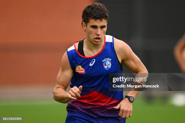 Joel Freijah of the Bulldogs competes in the 2km time trial trains during a Western Bulldogs AFL training session at Whitten Oval on November 27,...