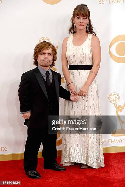 Actor Peter Dinklage and Erica Schmidt arrive at the 65th Annual Primetime Emmy Awards held at Nokia Theatre L.A. Live on September 22, 2013 in Los...