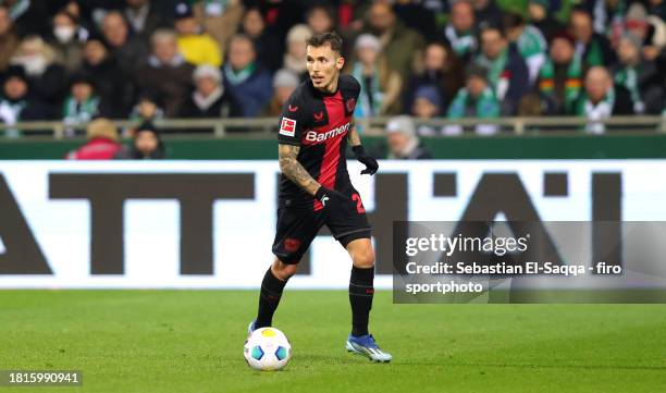 Alex Grimaldo of Bayer 04 Leverkusen plays the ball during the Bundesliga match between SV Werder Bremen and Bayer 04 Leverkusen at Wohninvest...